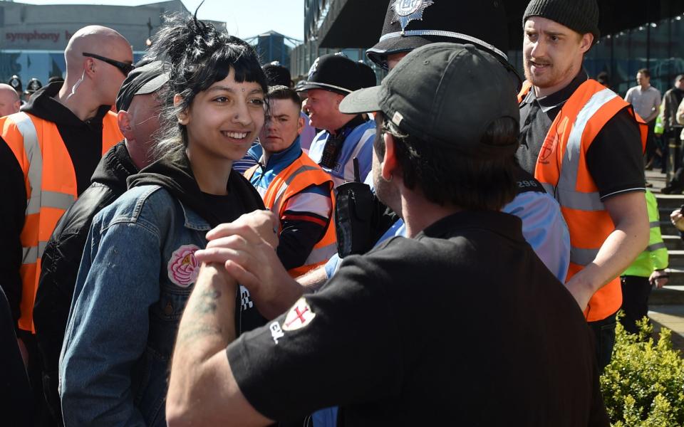 Facing violence with a smile: Saffiyah Khan said she was 'not scared in the slightest' as she faced down Ian Crossland - Credit: Joe Giddens/PA Wire