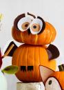 <p><em>H00</em> could resist crafting this stacked owl? <br><strong><br>Make the pumpkin:</strong> For the face, cut two circles (around the same circumference as a cupcake liner) on light brown paper and glue them to the bottom of two white liners. Cut out or draw two smaller black dots for the pupils. As for the lashes, cut a brown cupcake liner in half. Hot glue the eyes to the pumpkin.</p><p>For wings, cut a brown and a white liner in half and attach to the sides of bottom pumpkin. Cut a triangle beak and feet from black card stock and glue to the body. </p>