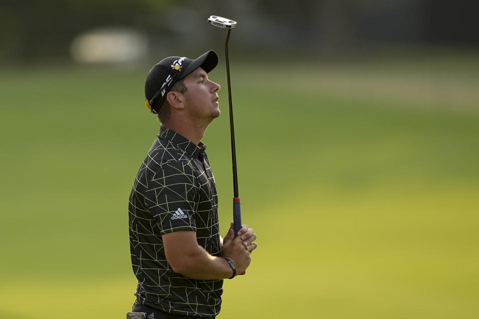 Lucas Herbert, of Australia, reacts after missing a putt on the seventh hole during the first round of the PGA Championship golf tournament at Southern Hills Country Club, Thursday, May 19, 2022, in Tulsa, Okla. (AP Photo/Eric Gay)