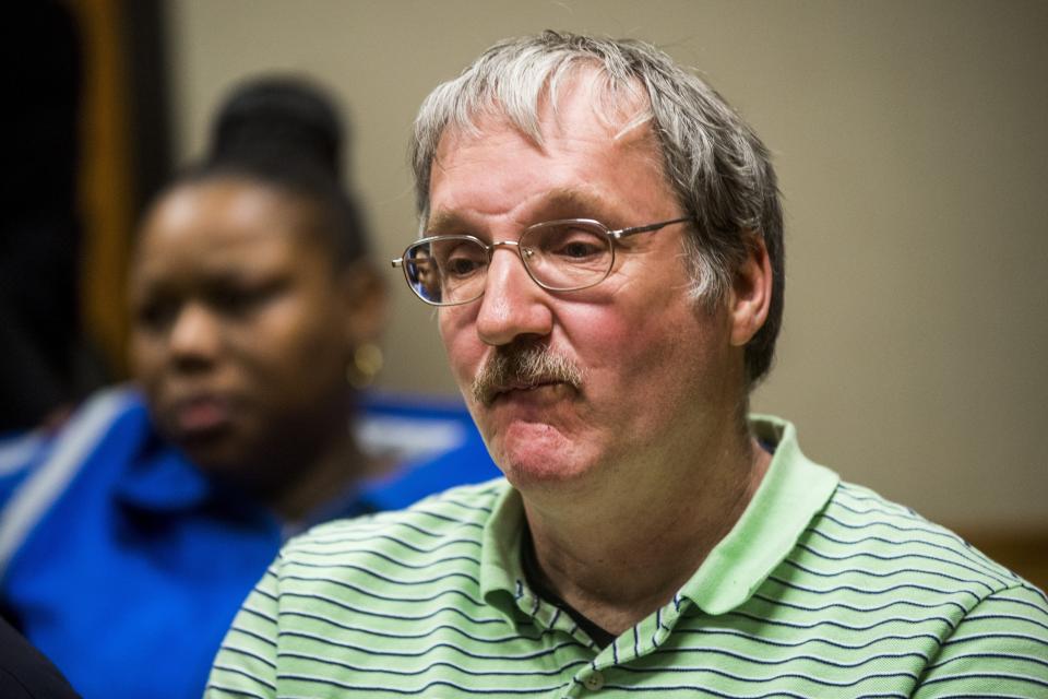 FILE- In an April 20, 2016, file photo, Michigan Department of Environmental Quality employee Michael Prysby waits in the gallery before his arraignment in Flint, Mich. Prysby, Liane Shekter Smith, and Stephen Busch of the MDEQ recently accepted plea deals in the Flint water criminal investigation. Some Flint residents are upset, saying key people who could have stopped the lead disaster in 2014-15 are getting off easy. (Jake May/The Flint Journal via AP, File)