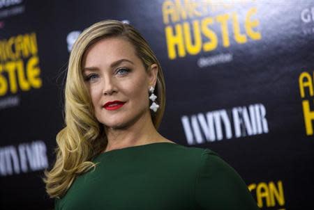 Cast member Elisabeth Rohm attends the "American Hustle" movie premiere in New York December 8, 2013. REUTERS/Eric Thayer