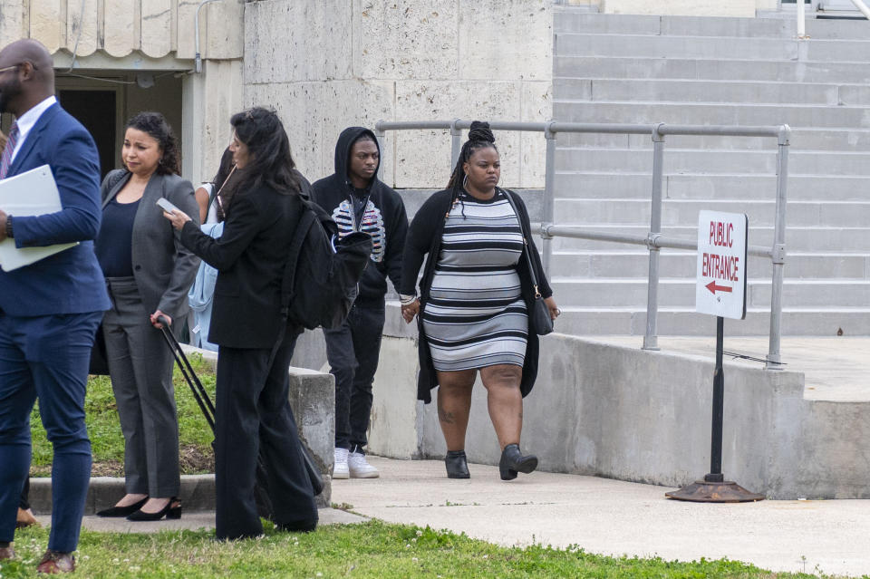 Darryl George, and his mother Darresha leave the courthouse after an unfavorable verdict regarding George's punishment for violating school dress code policy because of his hair style, Thursday Feb. 22, 2024 at the Chambers County Courthouse in Anahuac, Texas. A judge has ruled that George's monthslong punishment by his Texas school district for refusing to change his hairstyle does not violate a new state law prohibiting race-based hair discrimination. (Kirk Sides/Houston Chronicle via AP)