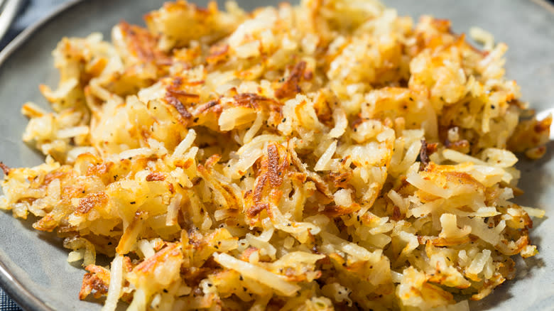 shredded hashed browns on plate