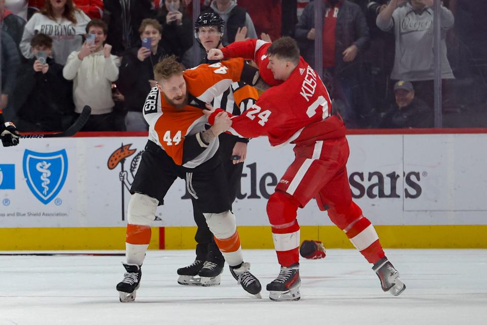 Philadelphia Flyers left wing Nicolas Deslauriers (44) and Detroit Red Wings center Klim Kostin (24) fight in the second period at Little Caesars Arena in Detroit on Thursday, Jan. 25, 2024.