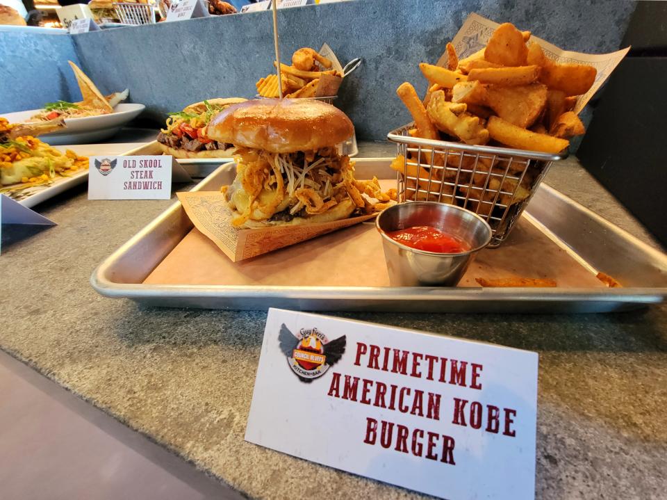 The Primetime American Kobe Burger at Guy Fieri's Kitchen + Bar in Council Bluffs is a thicker burger.