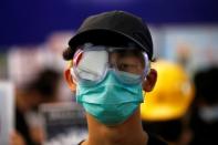 Protest at Yuen Long MTR station, the scene of an attack by suspected triad gang members a month ago