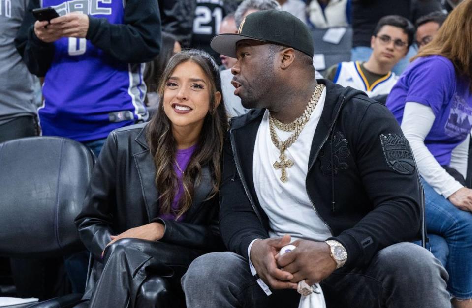 Anjali Ranadivé, the daughter of Sacramento Kings owner Vivek Ranadivé, sits courtside with recording artist 50 Cent during Game 2 of the first-round NBA playoff series against the Golden State Warriors at Golden 1 Center in April.