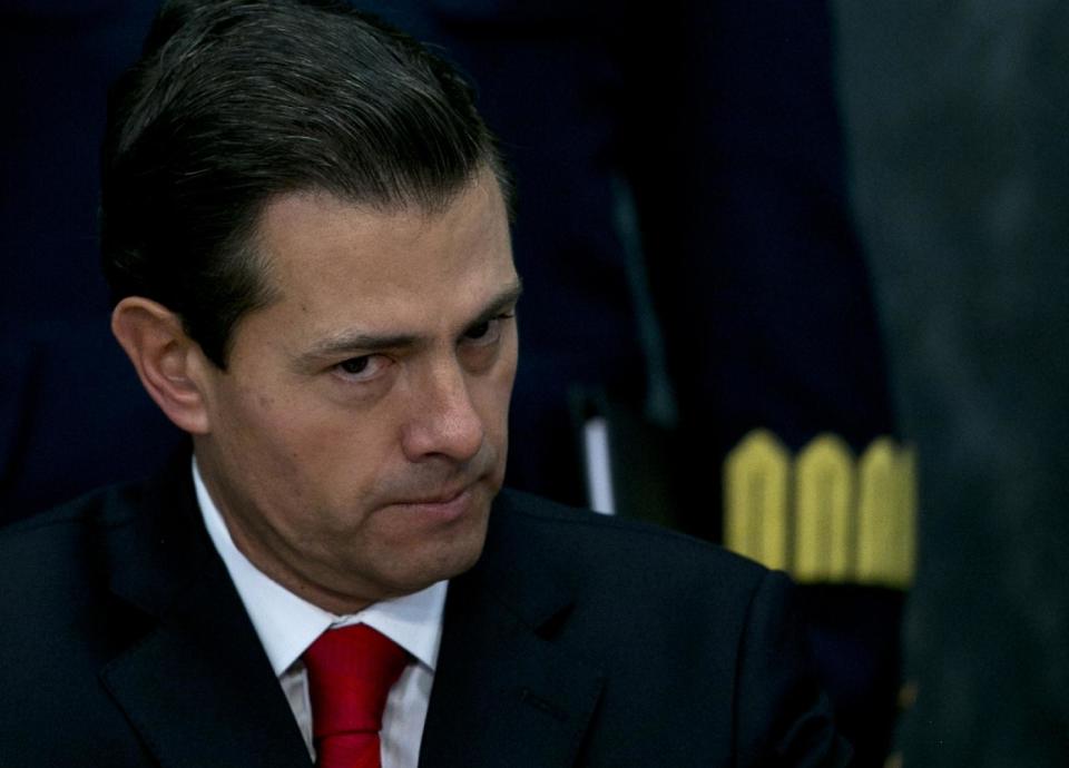 In this Jan. 23, 2017 photo, Mexico's President Enrique Pena Nieto makes a pause during a press conference at the Los Pinos presidential residence in Mexico City. Mexico says President Enrique Pena Nieto has talked with Canadian Prime Minister Justin Trudeau about the North American Free Trade Agreement ahead of planned meetings with U.S. President Donald Trump. (AP Photo/Marco Ugarte)