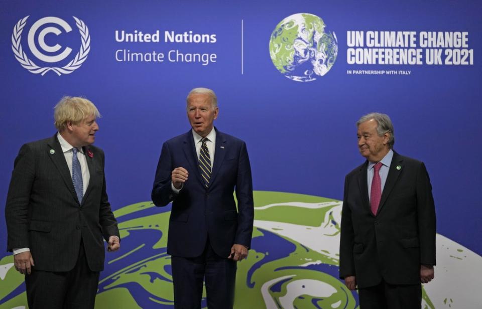 Boris Johnson and UN Secretary-General Antonio Guterres greet US pesident Joe Biden at the Cop26 summit (Alastair Grant/PA) (PA Wire)