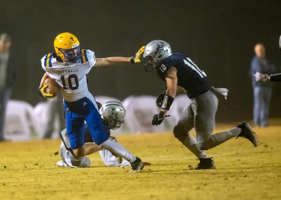 Tattnall sophomore wide receiver Ty Hunnicutt (10) tries to stiff arm Stratford linebacker Brooks Garner (18) in Friday night’s GIAA Class AAAA semifinal.