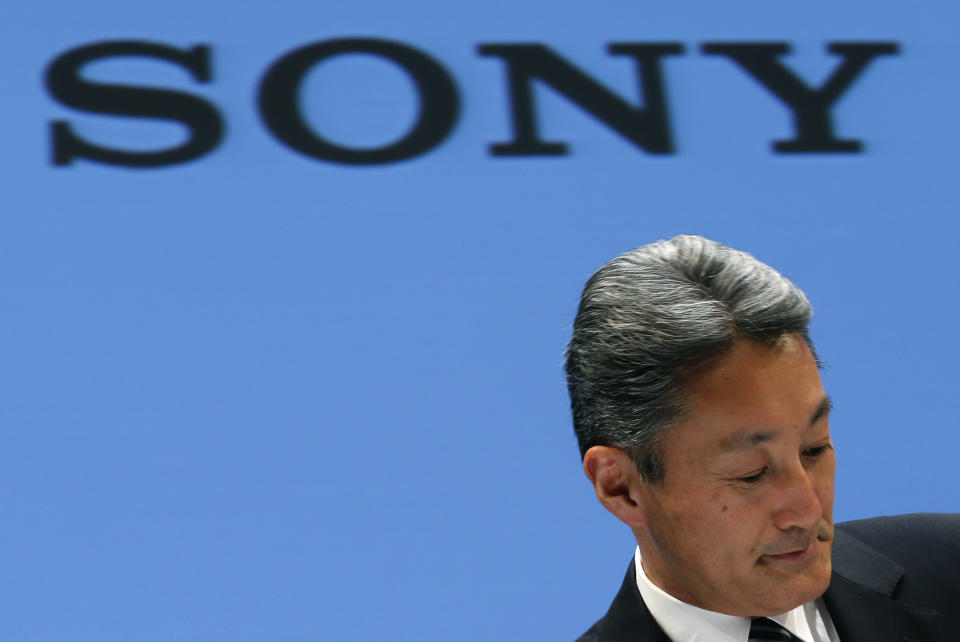 Sony Corp. President and CEO Kazuo Hirai reacts during a press conference at the Sony headquarters in Tokyo Thursday, Feb. 6, 2014. Sony is in talks to sell its troubled personal computer business and Thursday lowered its earnings forecast for the business year ending March to a 110 billion yen loss ($1.1 million).The company also said it's cutting its global workforce by about 3 percent or 5,000 people by the end of March 2015 as it restructures its PC, television and other businesses. (AP Photo/Shizuo Kambayashi)