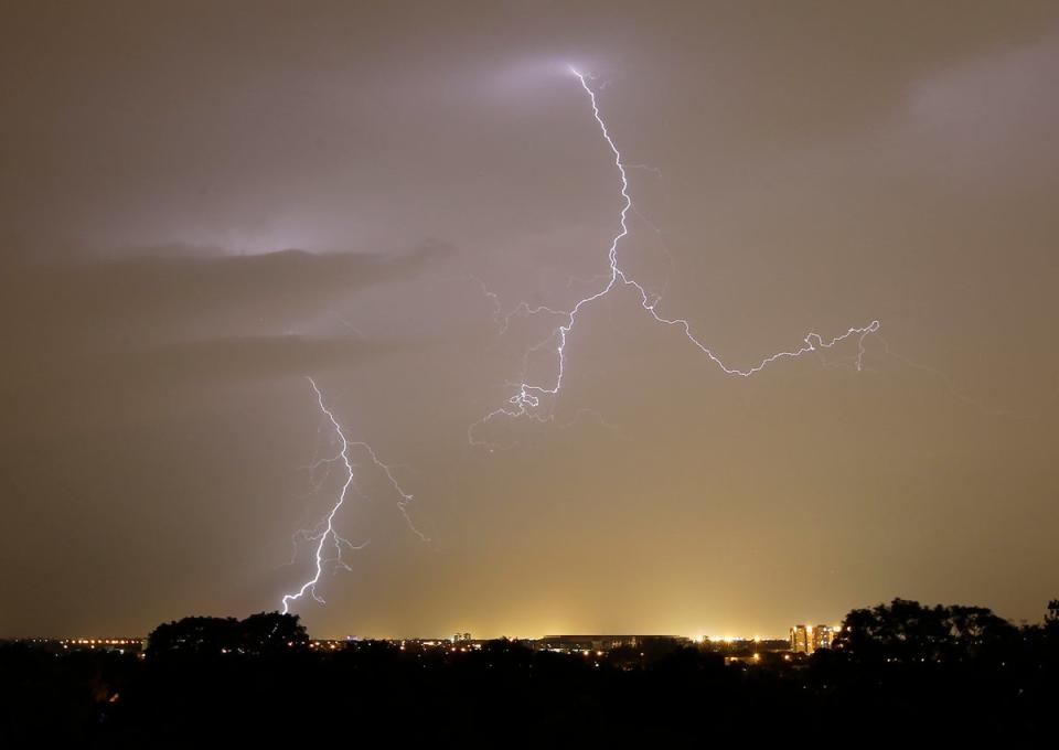 More than 36,000 lightning strikes were recorded across the UK in just 12 hours on Sunday night (PA Archive)