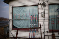 Pairs of skis are seen at an abandoned ski rental shop in front of the Alps Ski Resort located near the demilitarised zone separating the two Koreas in Goseong, South Korea, January 17, 2018. REUTERS/Kim Hong-Ji