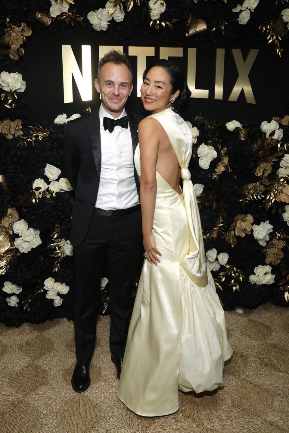 beverly hills, california january 07 l r russ armstrong and greta lee attend netflixs 2024 golden globe after party at spago on january 07, 2024 in beverly hills, california photo by emma mcintyregetty images for netflix