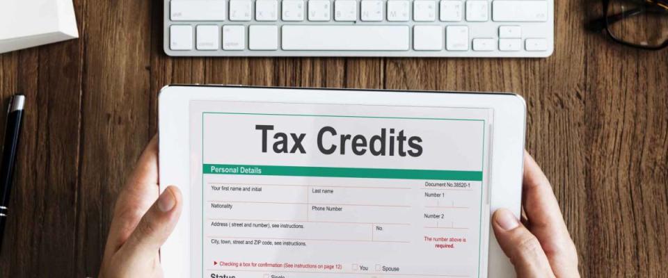 Tax Credits Claim Return Deduction Refund Concept