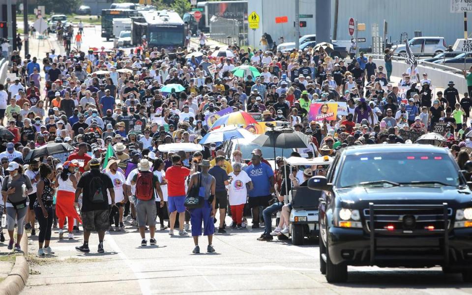 Opal Lee, 94, and hundreds of others walk towards downtown Fort Worth from Evans Avenue Plaza during the first national Juneteenth holiday on June 19, 2021. Lee makes the 2.5-mile walk to symbolize the two and a half years it took for slaves in Texas to realize they had been freed.