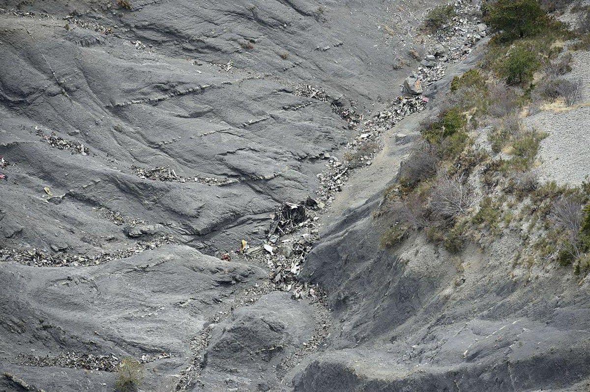 This aerial photo taken from a helicopter  shows debris at the crash site (LIONEL BONAVENTURE/AFP/Getty Images)