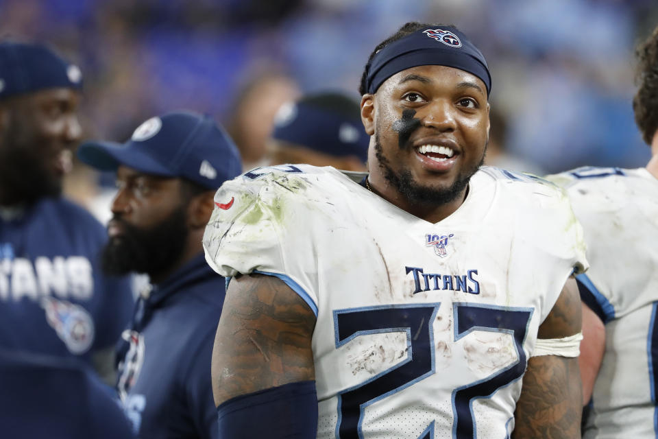 Jan 11, 2020; Baltimore, Maryland, USA; Tennessee Titans running back Derrick Henry (22) smiles on the bench against the Baltimore Ravens in the final minute of the fourth quarter in a AFC Divisional Round playoff football game at M&T Bank Stadium. Mandatory Credit: Geoff Burke-USA TODAY Sports