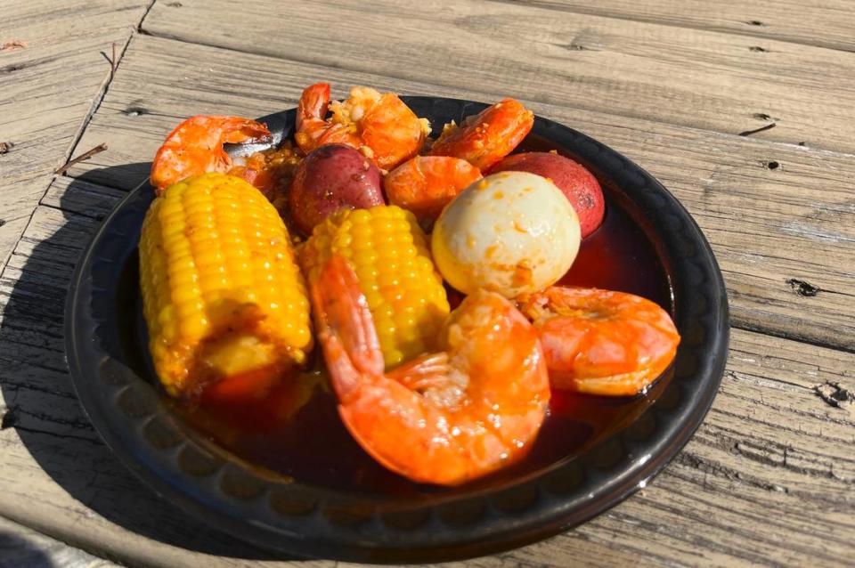 A half pound of shrimp at Catch 21 comes with corn, potatoes and a boiled egg.