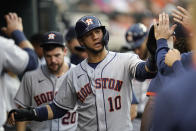 Houston Astros 'Yuli Gurriel (10) celebrates scoring against the Detroit Tigers in the fourth inning of a baseball game in Detroit, Thursday, June 24, 2021. (AP Photo/Paul Sancya)