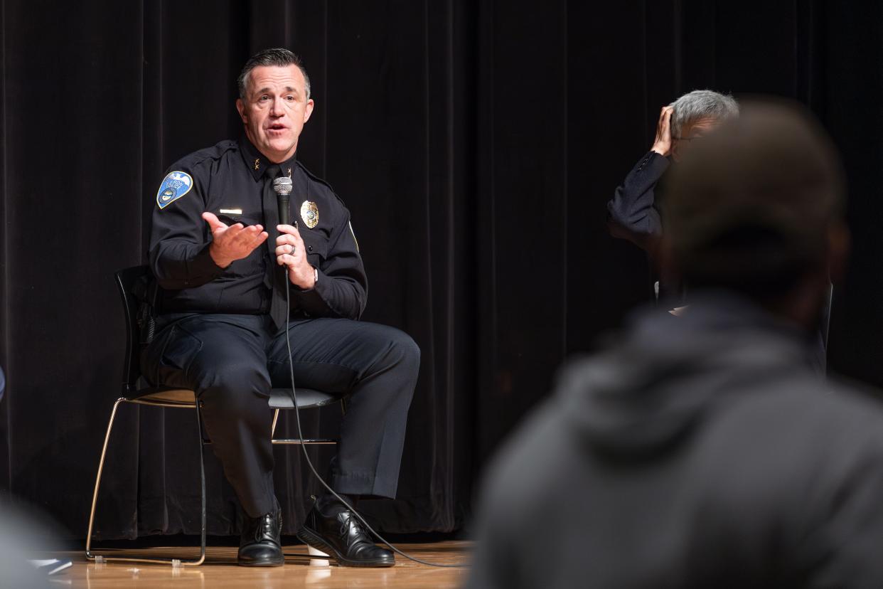 Deputy Police Chief Brian Harding answers audience questions at a community town hall forum Saturday morning, April 20, 2024, at Buchtel CLC in Akron.