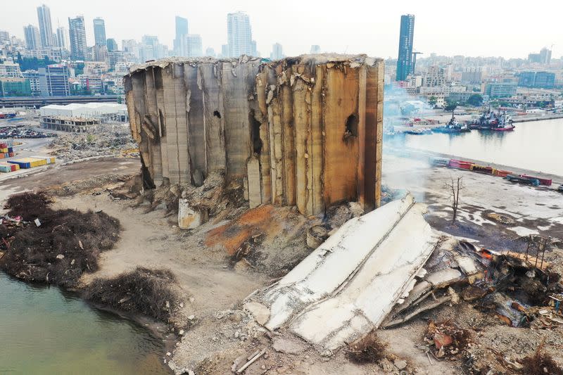 FILE PHOTO: Smoke rises from the newly collapsed part of the Beirut grain silos damaged during August 2020 blast as Lebanon marks the two-year anniversary of the explosion