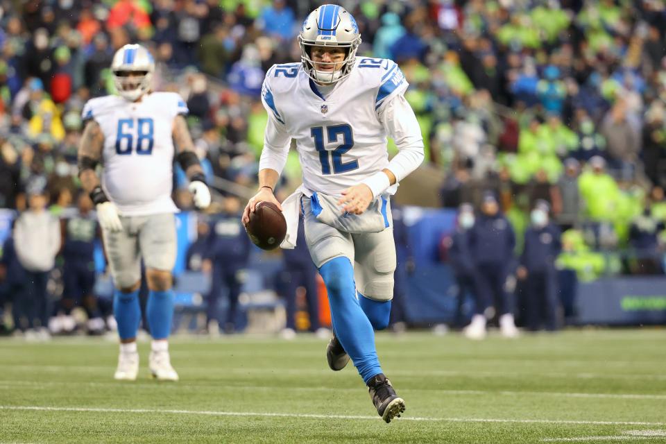 Quarterback Tim Boyle runs with the ball during the fourth quarter of the Lions' 51-29 loss to the Seahawks on Sunday, Jan. 2, 2022, in Seattle.