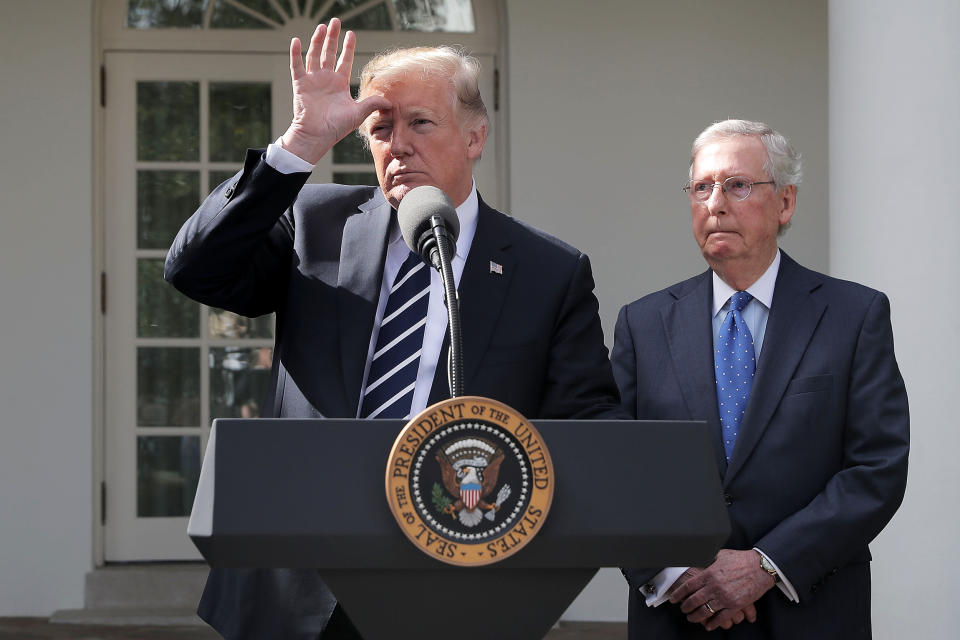 President Donald Trump and Senate Majority Leader Mitch McConnell talk to reporters in the Rose Garden of the White House on Oct. 16, 2017. (Chip Somodevilla / Getty Images file)