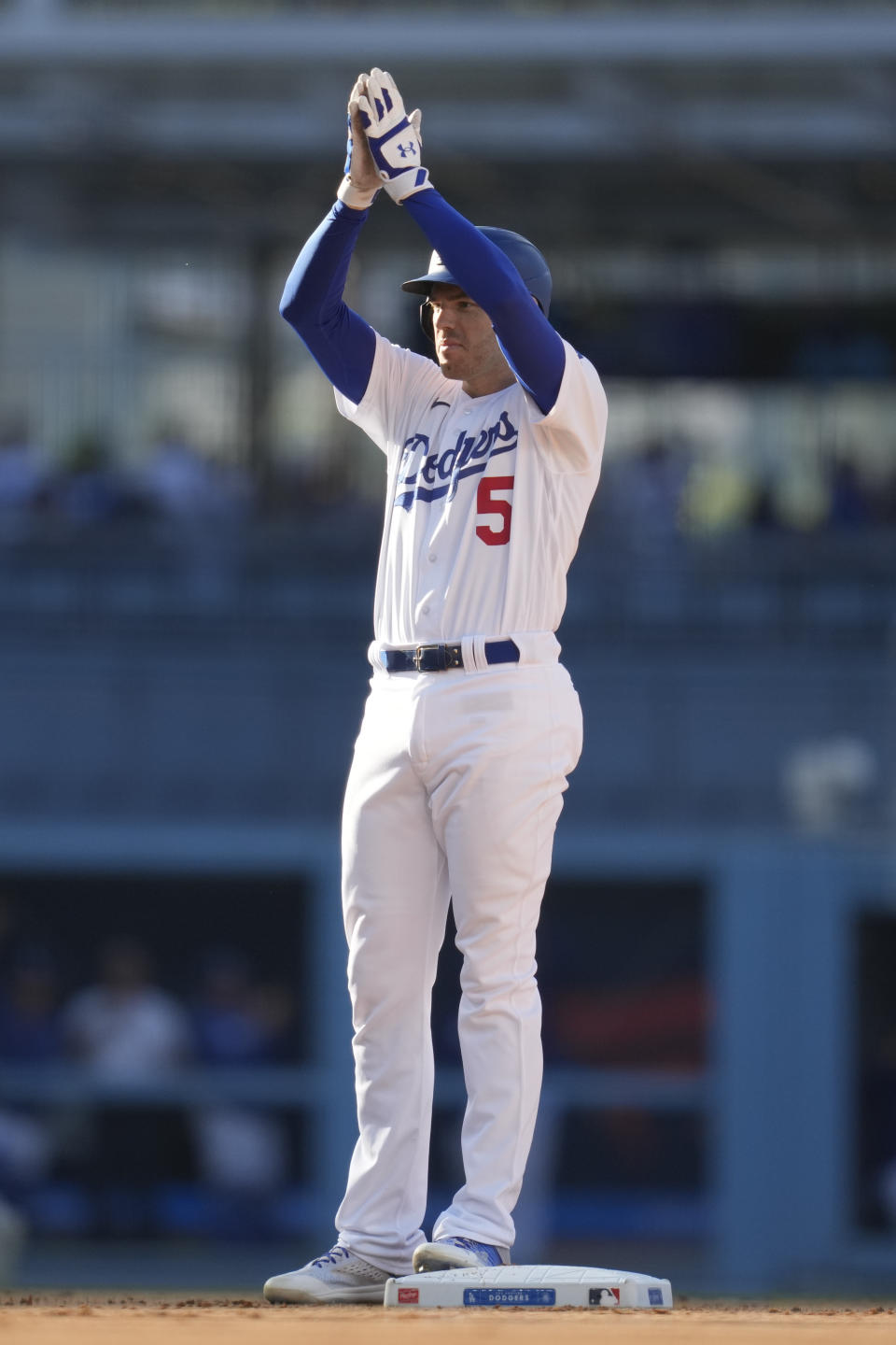 Los Angeles Dodgers' Freddie Freeman (5) celebrates after a double during the eighth inning of a baseball game against the Houston Astros in Los Angeles, Sunday, June 25, 2023. Mookie Betts scored. (AP Photo/Ashley Landis)