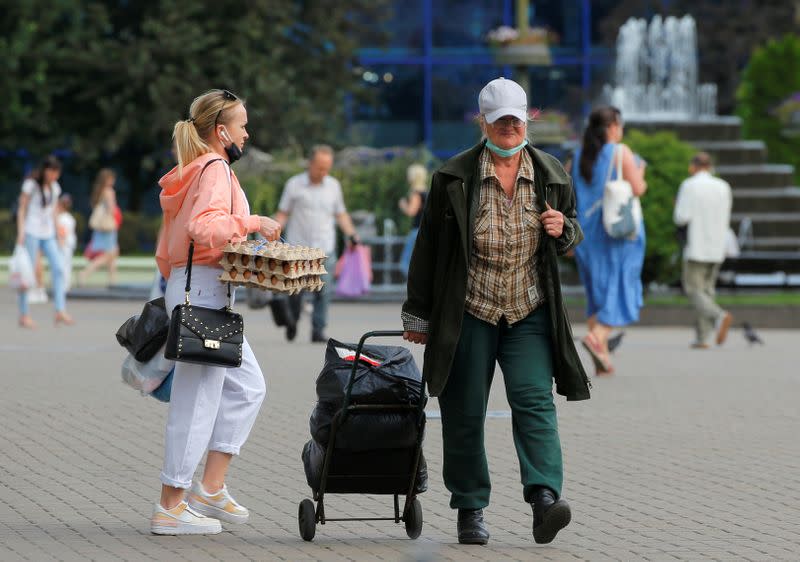 Customers carry foodstuff in Minsk