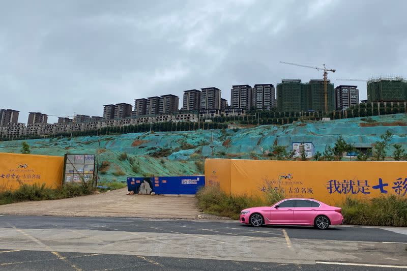 Construction site of a real estate project is seen at the Changyao Mountain on the southeast edge of the Dianchi Lake, in Kunming,