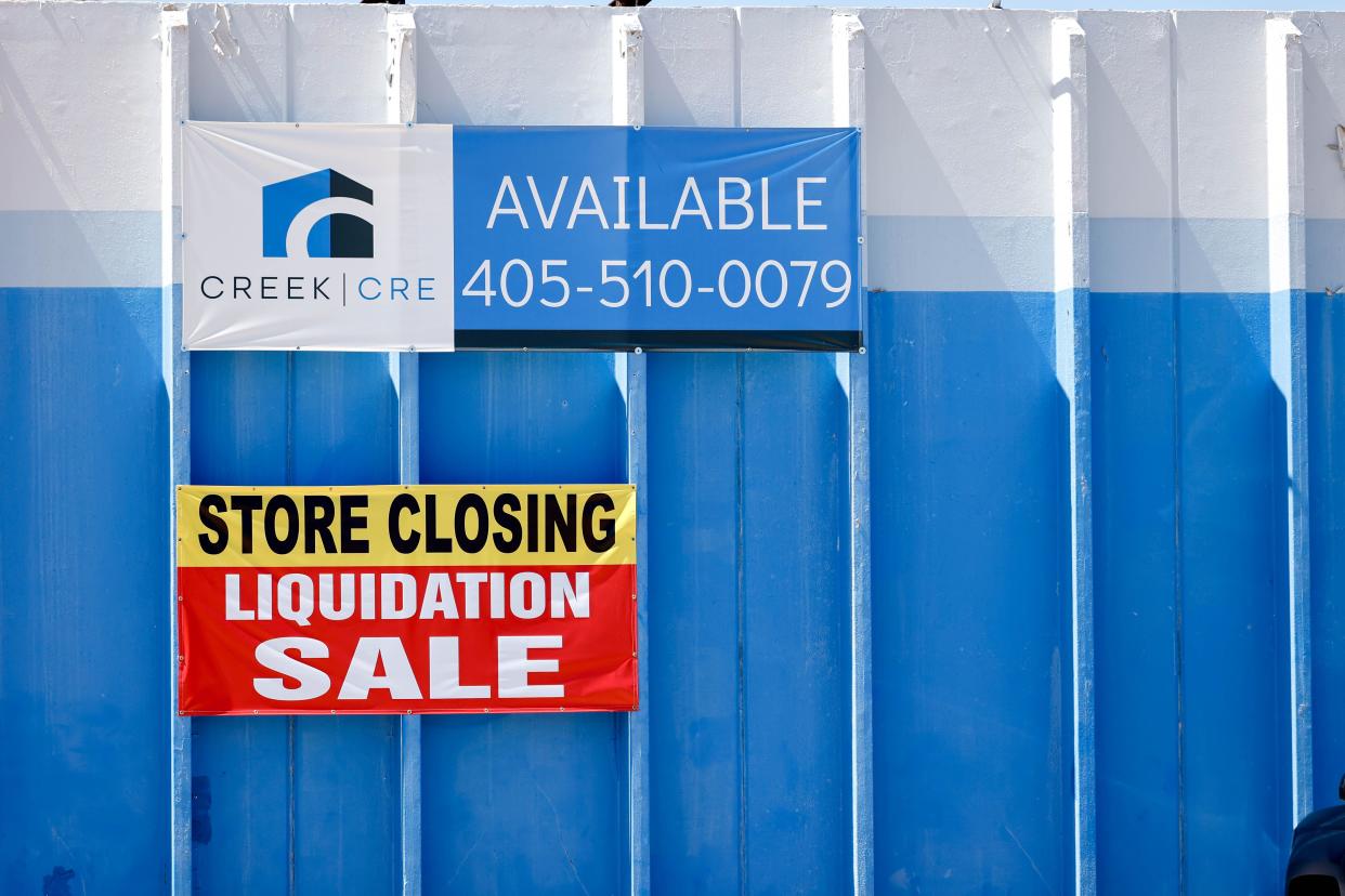 Store closing signs are displayed April 4 ahead of the closure of Jude ’n’ Jody & Sons Furniture in Oklahoma City.