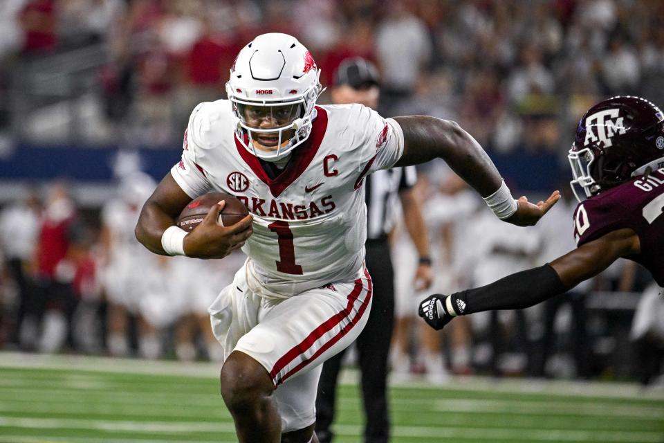 Sep 24, 2022; Arlington, Texas; Arkansas Razorbacks quarterback KJ Jefferson (1) runs for a touchdown against the Texas A&M Aggies during the second half at AT&T Stadium. Jerome Miron-USA TODAY Sports