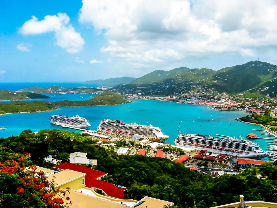 cruise ships docked at island