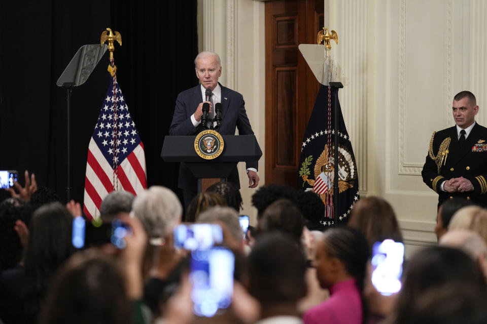 President Joe Biden speaks before the screening of the movie "Till" in the East Room of the White House in Washington, Thursday, Feb. 16, 2023. The movie, "Till," is the story of Mamie Till-Mobley who pursued justice after the lynching of her 14-year-old son, Emmett Till, in 1955. (AP Photo/Susan Walsh)