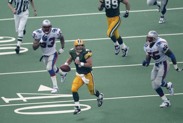 Brett Favre on the run during the Packers' 1996 Super Bowl victory over the New England Patriots. (Photo: Peter Brouillet via Getty Images)