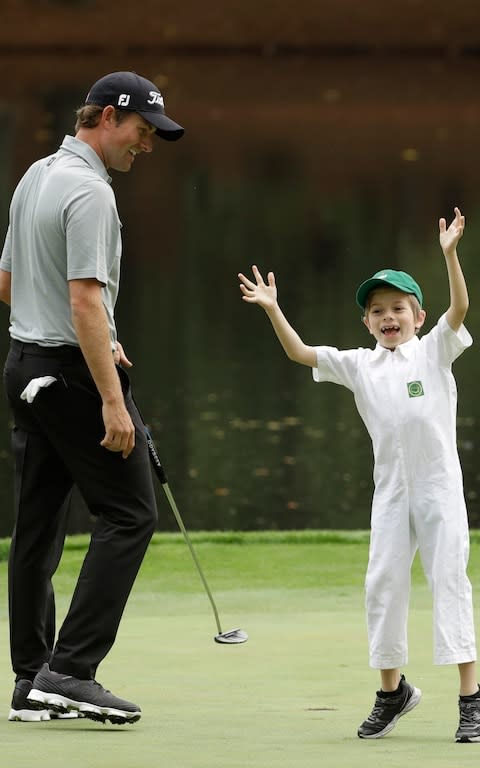 Webb Simpson and son James - Credit: AP