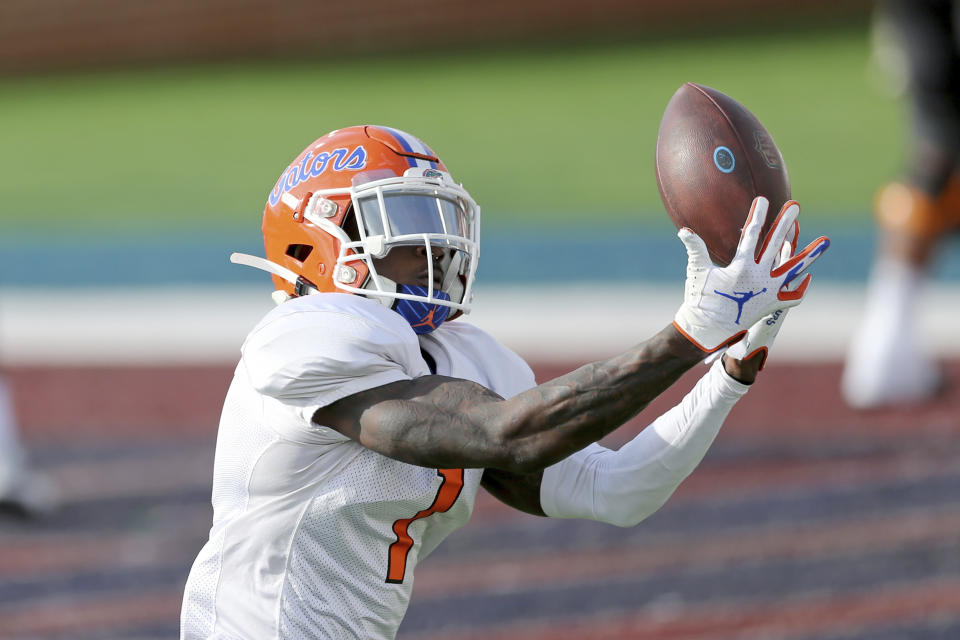 FILE - In this Jan. 27, 2021, file photo, American Team wide receiver Kadarius Toney, of Florida, catches a pass during practice for the Senior Bowl NCAA college football game in Mobile, Ala. Toney was selected in the first round of the 2021 NFL football draft by the New York Giants. (AP Photo/Rusty Costanza, File)