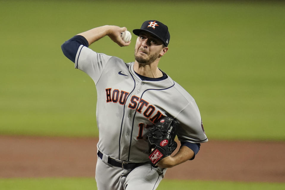 Houston Astros starting pitcher Jake Odorizzi throws a pitch to the Baltimore Orioles during the first inning of a baseball game, Monday, June 21, 2021, in Baltimore. (AP Photo/Julio Cortez)