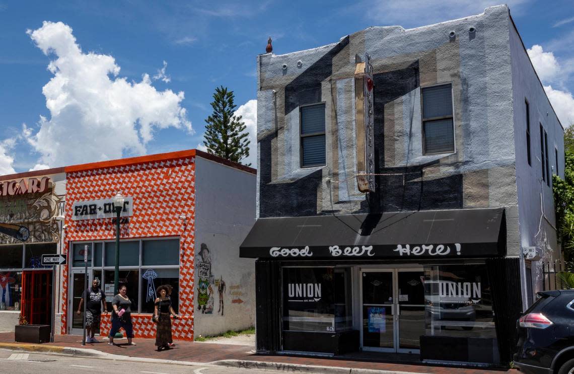 The new Far Out Pizza Restaurant, left, is right across the alley from Union Beer. Both are owned by David and Cici Rodriguez.