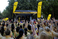 Australian sports fans gathering before spelling out the word G'Day on Clapham Common in London, Wednesday, July 25, 2012. The fans attempted to break the Guinness World record for The Most People Wearing The Same Full Team Kit.