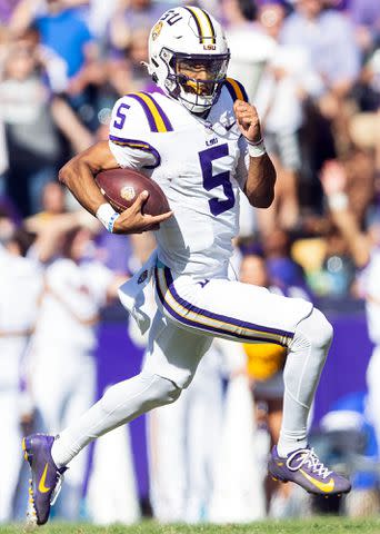 <p>John Korduner/Icon Sportswire/Getty </p> Jayden Daniels during a game between the Texas A&M Aggies and the LSU Tigers on November 25, 2023.