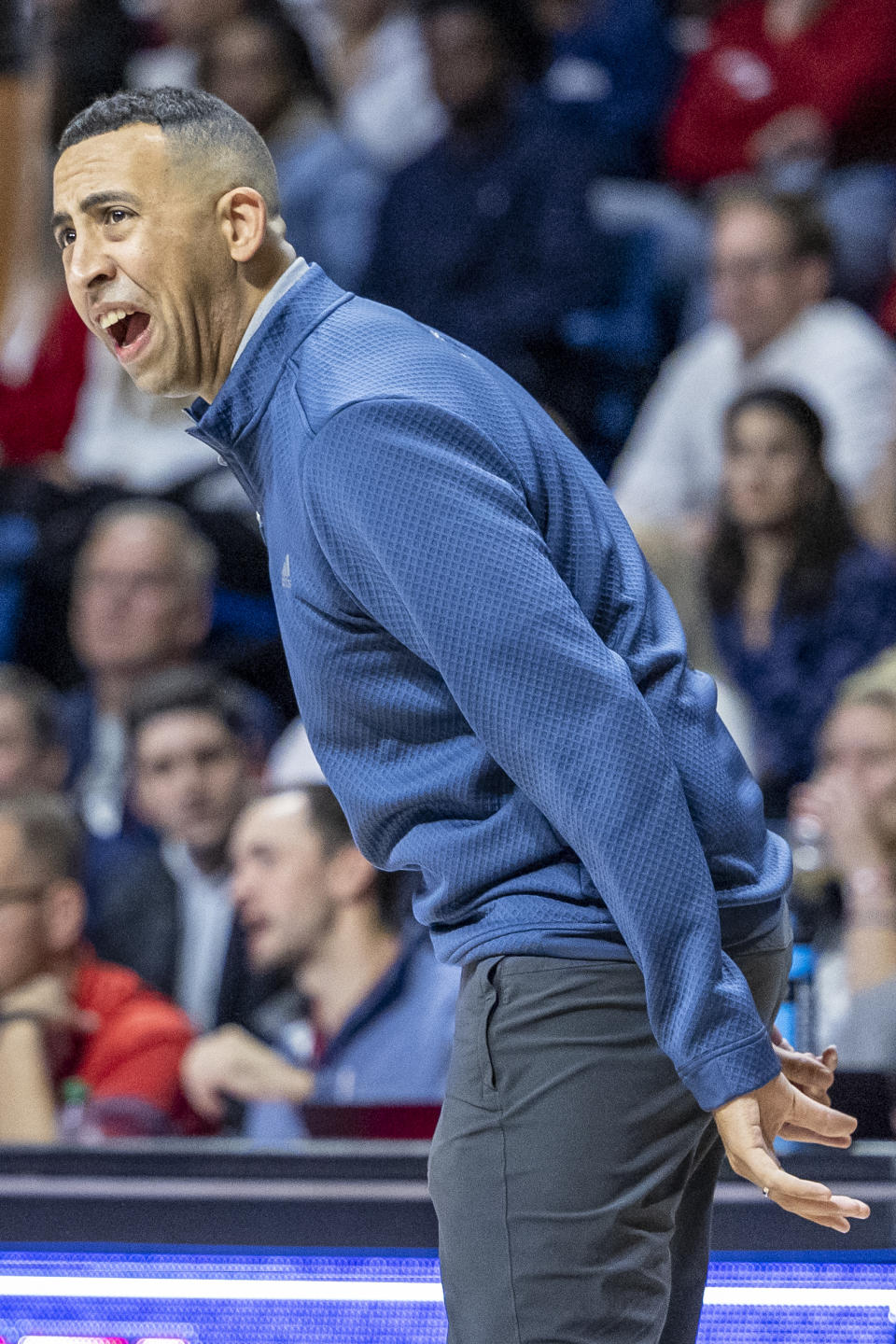 South Alabama head coach Richie Riley works with his team during the first half of an NCAA college basketball game against Alabama, Tuesday, Nov. 15, 2022, in Mobile, Ala. (AP Photo/Vasha Hunt)