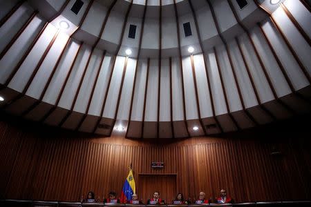 Venezuela's Supreme Court Second Vice President and President of the Constitutional Chamber Juan Mendoza (C) gives a news conference in Caracas, Venezuela, July 21, 2017. REUTERS/Carlos Garcia Rawlins