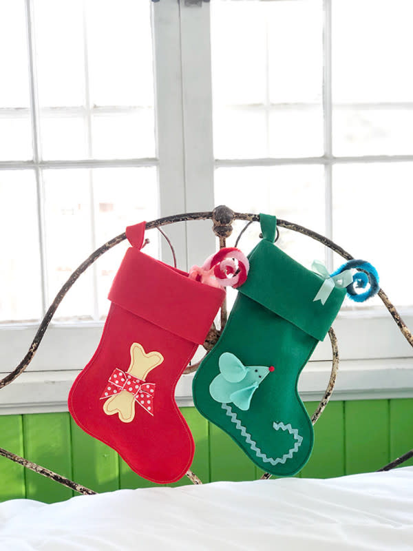 <p>Handmade Charlotte</p><p>Don’t forget about your pets this holiday season! Have your kids DIY them custom Christmas stockings just like the ones from <em><a href="https://www.handmadecharlotte.com/diy-pet-stockings/" rel="nofollow noopener" target="_blank" data-ylk="slk:Handmade Charlotte;elm:context_link;itc:0;sec:content-canvas" class="link rapid-noclick-resp">Handmade Charlotte</a></em>. They are dog- and cat-approved.</p>