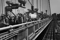 <p><b><b>DNC - Day 1</b></b></p><p>Supporters of Bernie Sanders cross the Benjamin Franklin Bridge from Camden, NY at the Democratic National Convention Monday, July 25, 2016, in Philadelphia, PA.(Photo: Khue Bui for Yahoo News)</p>