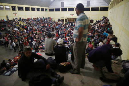 Honduran migrants, part of a caravan trying to reach the U.S., are pictured inside an improvised shelter during a new leg of their travel in Chiquimula, Guatemala October 16, 2018. REUTERS/Edgard Garrido