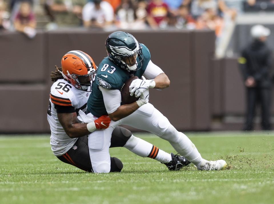 Aug 21, 2022; Cleveland, Ohio, USA; Cleveland Browns linebacker Dakota Allen (56) tackles Philadelphia Eagles tight end Noah Togiai (83) during the second quarter at FirstEnergy Stadium. Mandatory Credit: Scott Galvin-USA TODAY Sports