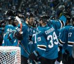 May 25, 2016; San Jose, CA, USA; San Jose Sharks center Tomas Hertl (48) celebrates with center Logan Couture (39) after defeating the St. Louis Blues 5-2 to win the Western Conference Finals of the 2016 Stanley Cup Playoffs at SAP Center at San Jose. Mandatory Credit: Kelley L Cox-USA TODAY Sports