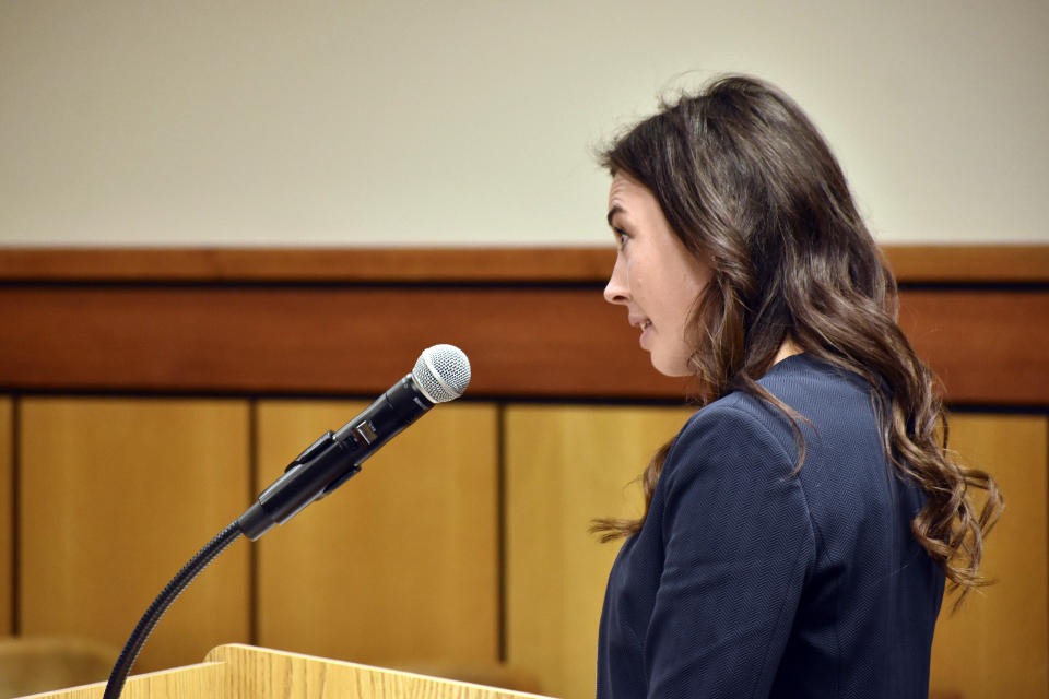 Montana Assistant Solicitor General Katie Smithgall addresses the court during a hearing in state District Court on Thursday, Sept. 15, 2022, in Billings, Mont., defending the state's adoption of a rule that made it harder for transgender people to change their birth certificate. District Court Judge Michael Moses said the rule violated an April court order. (AP Photo/Matthew Brown)